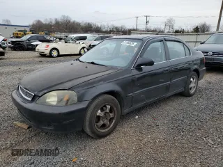 1999 Honda Civic LX with VIN 2HGEJ6677XH585273, listed as a Copart auction lot 51164635 with 184,874 mi miles and Salvage Title. Bid and sale history available at carsss.com. Image 1.