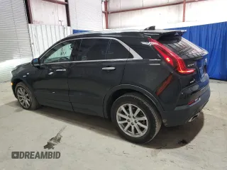 2021 Cadillac XT4 AWD Luxury with VIN 1GYFZBR42MF055788, listed as a Copart auction lot 46704275 with 23,516 mi miles and Clean Title. Bid and sale history available at carsss.com. Image 2.