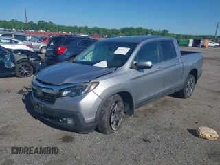 2017 Honda Ridgeline RTL-T z VIN 5FPYK3F64HB022095, wystawiony jako IAAI lot #42219954 z przebiegiem 85 876 mil mil oraz . Historia ofert i sprzedaży dostępna na DreamBid. Obrazek 2.