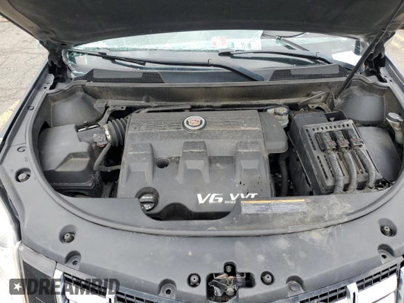 2014 Cadillac SRX Premium Collection z VIN 3GYFNGE31ES688270, wystawiony jako Copart lot #52795245 z przebiegiem 134 103 mil mil oraz Szkoda całkowita • Salvage title. Historia ofert i sprzedaży dostępna na DreamBid. Obrazek 13.