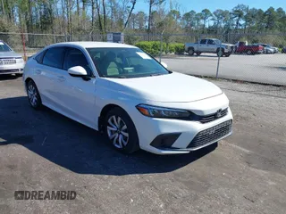 2022 Honda Civic Sedan LX with VIN 2HGFE2F26NH545818, listed as a IAAI auction lot 41817630 with 28,650 mi miles. Bid and sale history available at carsss.com. Image 1.