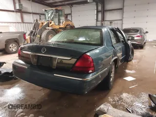 2008 Mercury Grand Marquis GS with VIN 2MEFM74V08X664002, listed as a IAAI auction lot 41610592 with Not Provided miles and . Bid and sale history available at DreamBid. Image 4.