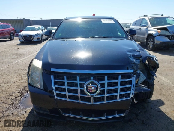 2013 Cadillac CTS Luxury with VIN 1G6DE5E51D0165634, listed as a IAAI auction lot 42208023 with 92,827 mi miles and . Bid and sale history available at DreamBid. Image 12.