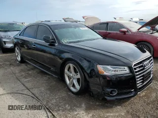 2018 Audi A8 z VIN WAU44AFD0JN000782, wystawiony jako Copart lot #68575924 z przebiegiem 99 098 mil mil oraz Nie do naprawy • Non repairable. Historia ofert i sprzedaży dostępna na DreamBid. Obrazek 4.