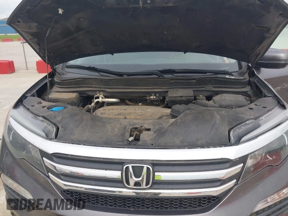 2017 Honda Pilot EX-L with VIN 5FNYF6H53HB038128, listed as a IAAI auction lot 42300311 with 176,928 mi miles and . Bid and sale history available at DreamBid. Image 10.