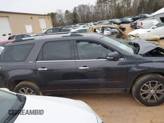 2014 GMC Acadia SLT with VIN 1GKKRRKD8EJ328145, listed as a IAAI auction lot 41376965 with 128,711 mi miles. Bid and sale history available at carsss.com. Image 13.