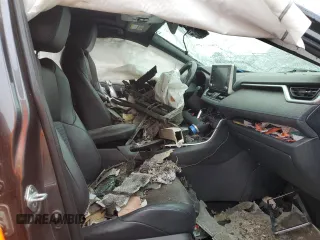 2019 Toyota RAV4 Hybrid XSE with VIN JTMEWRFV3KD517901, listed as a Copart auction lot 57329545 with Not provided miles and Salvage title. Bid and sale history available at DreamBid. Image 7.