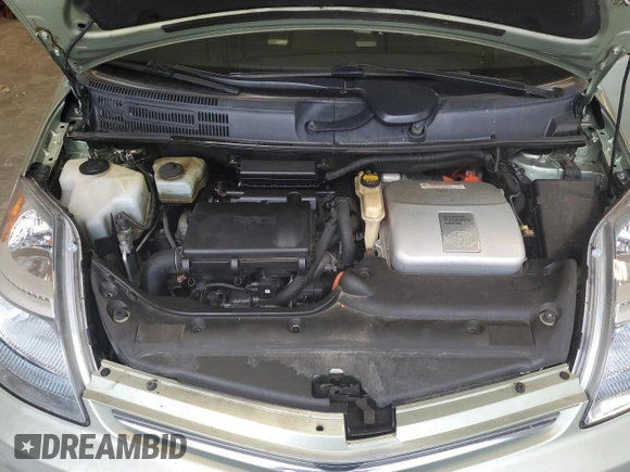 2007 Toyota Prius z VIN JTDKB20U577556730, wystawiony jako Copart lot #61117255 z przebiegiem Nie podano mil oraz Nie do naprawy • Non repairable. Historia ofert i sprzedaży dostępna na DreamBid. Obrazek 12.
