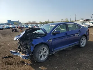 2014 Ford Taurus SEL z VIN 1FAHP2E88EG174797, wystawiony jako Copart lot #53961615 z przebiegiem Nie podano mil oraz Szkody całkowita. Historia ofert i sprzedaży dostępna na DreamBid. Obrazek 1.