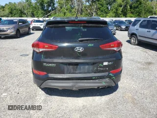 2016 Hyundai Tucson Sport with VIN KM8J33A26GU161089, listed as a Copart auction lot 52941915 with 190,392 mi miles and Salvage Title. Bid and sale history available at carsss.com. Image 6.