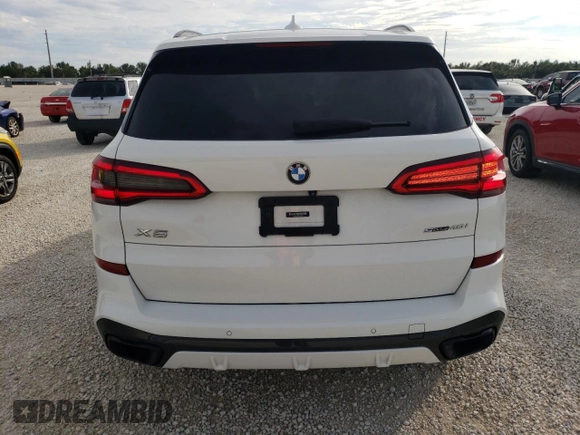 2020 BMW X5 sDrive40i with VIN 5UXCR4C02LLW63576, listed as a Copart auction lot 71912802 with 27,686 mi miles. Bid and sale history available at carsss.com. Image 6.
