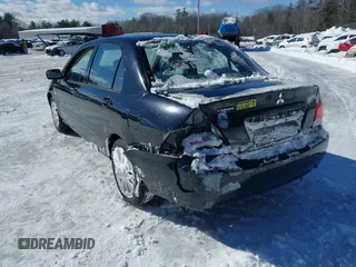 2006 Mitsubishi Lancer ES with VIN JA3AJ26E06U000385, listed as a IAAI auction lot 41587490 with 185,100 mi miles. Bid and sale history available at carsss.com. Image 6.