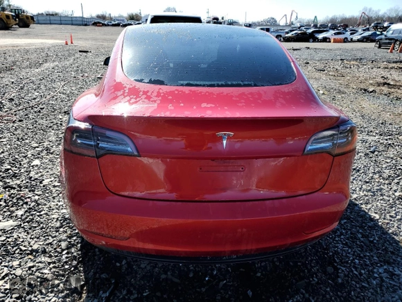 2022 Tesla Model 3 with VIN 5YJ3E1EA5NF184785, listed as a Copart auction lot 49466575 with 85,273 mi miles and Salvage Title. Bid and sale history available at DreamBid. Image 6.
