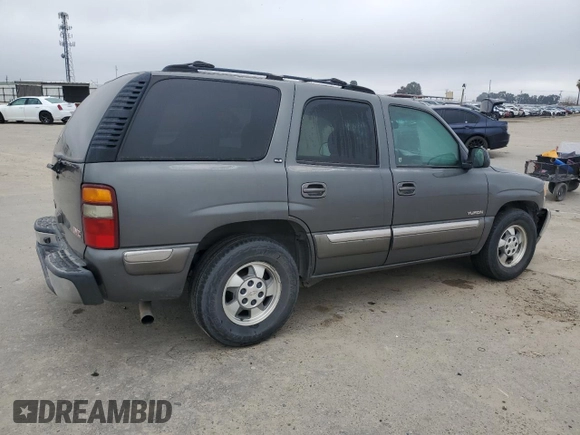 2002 GMC Yukon SLE z VIN 1GKEC13V52J192656, wystawiony jako Copart lot #46674605 z przebiegiem 258 336 mil mil oraz Szkoda całkowita • Salvage title. Historia ofert i sprzedaży dostępna na DreamBid. Obrazek 3.