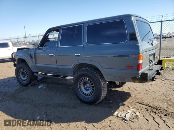 1987 Toyota Land Cruiser z VIN JT3FJ60G4H1135841, wystawiony jako Copart lot #88982685 z przebiegiem Nie podano mil oraz Nie do naprawy • Non repairable. Historia ofert i sprzedaży dostępna na DreamBid. Obrazek 2.