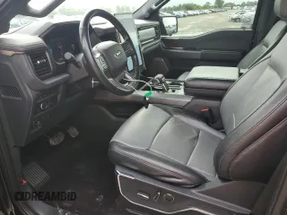 2022 Ford F-150 Lightning Pro with VIN 1FTVW1EL7NWG00726, listed as a Copart auction lot 57283755 with 55,672 mi miles and Salvage title. Bid and sale history available at DreamBid. Image 7.