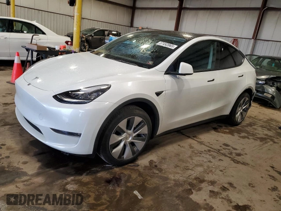 2022 Tesla Model Y Long Range z VIN 7SAYGDEEXNA012904, wystawiony jako Copart lot #57492865 z przebiegiem 31 294 mil mil oraz Szkody całkowita. Historia ofert i sprzedaży dostępna na DreamBid. Obrazek 1.