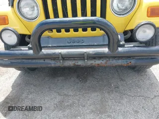 2004 Jeep Wrangler Sport z VIN 1J4FA49S04P701986, wystawiony jako IAAI lot #42256648 z przebiegiem 129 946 mil mil oraz . Historia ofert i sprzedaży dostępna na DreamBid. Obrazek 6.