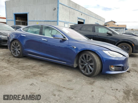 2020 Tesla Model S Long Range with VIN 5YJSA1E20LF415038, listed as a Copart auction lot 48950225 with 61,946 mi miles and Salvage title. Bid and sale history available at DreamBid. Image 4.