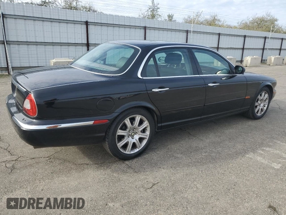 2004 Jaguar XJ with VIN SAJEA71C94SG11566, listed as a Copart auction lot 85281684 with 107,054 mi miles and Clean Title. Bid and sale history available at carsss.com. Image 3.