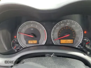 2010 Toyota Corolla with VIN 2T1BU4EEXAC457317, listed as a Copart auction lot 51596195 with 203,296 mi miles and Salvage Title. Bid and sale history available at carsss.com. Image 9.
