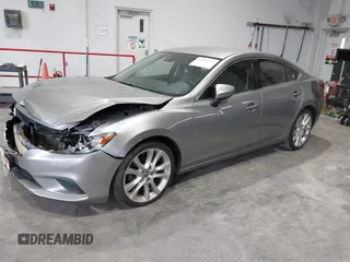 2014 Mazda 6 i Touring with VIN JM1GJ1T51E1106970, listed as a IAAI auction lot 42027350 with 113,756 mi miles and . Bid and sale history available at DreamBid. Image 17.
