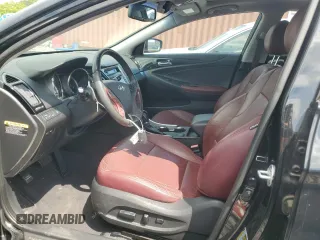 2012 Hyundai Sonata Limited z VIN 5NPEC4AB1CH365296, wystawiony jako Copart lot #58725255 z przebiegiem 118 332 mil mil oraz Szkoda całkowita • Salvage title. Historia ofert i sprzedaży dostępna na DreamBid. Obrazek 7.
