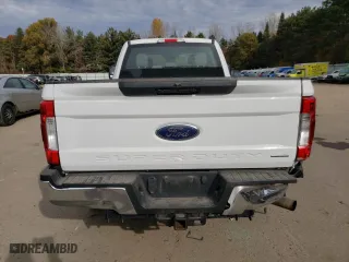 2017 Ford Super Duty F-250 SRW XLT with VIN 1FT7X2A60HEF21937, listed as a Copart auction lot 77828424 with 98,679 mi miles and Salvage Title. Bid and sale history available at carsss.com. Image 6.