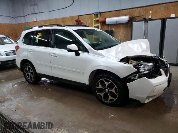 2014 Subaru Forester XT Touring with VIN JF2SJGMCXEH556507, listed as a Copart auction lot 56584515 with 145,113 mi miles and Clean title. Bid and sale history available at DreamBid. Image 4.