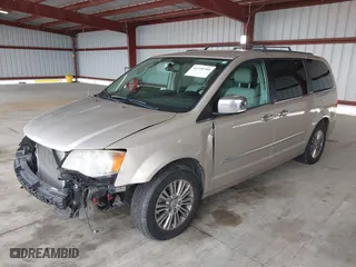 2013 Chrysler Town & Country Touring-L with VIN 2C4RC1CG1DR722666, listed as a IAAI auction lot 41735764 with 148,280 mi miles. Bid and sale history available at carsss.com. Image 2.