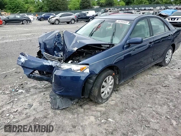2005 Toyota Camry LE z VIN 4T1BE30K95U072730, wystawiony jako Copart lot #56398505 z przebiegiem 115 917 mil mil oraz Czysty tytuł • Clean title. Historia ofert i sprzedaży dostępna na DreamBid. Obrazek 14.