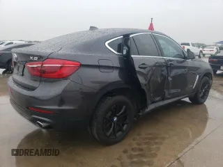 2015 BMW X6 sDrive35i with VIN 5UXKU0C59F0F91881, listed as a Copart auction lot 69878554 with 120,065 mi miles and Salvage Title. Bid and sale history available at carsss.com. Image 3.