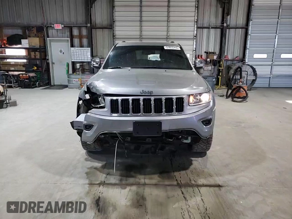 2015 Jeep Grand Cherokee Limited with VIN 1C4RJFBG2FC878523, listed as a Copart auction lot 51853755 with 124,743 mi miles and Salvage Title. Bid and sale history available at carsss.com. Image 12.