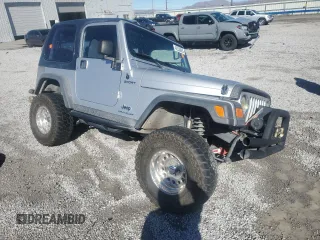 2005 Jeep Wrangler Sport with VIN 1J4FA49S05P375785, listed as a Copart auction lot 42350995 with 0 mi miles and Salvage Title. Bid and sale history available at carsss.com. Image 4.