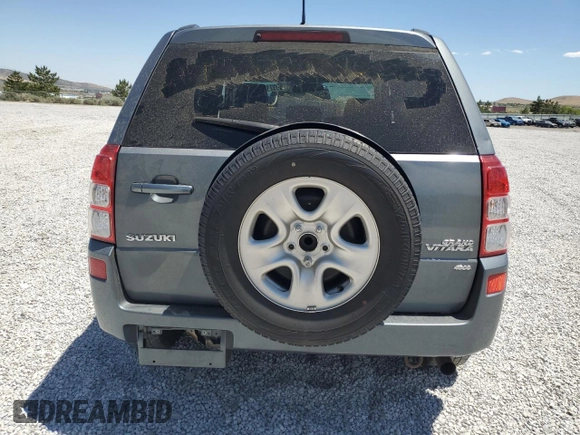 2006 Suzuki Grand Vitara Premium with VIN JS3TD943964102832, listed as a Copart auction lot 59971694 with 148,329 mi miles and Salvage title. Bid and sale history available at DreamBid. Image 6.
