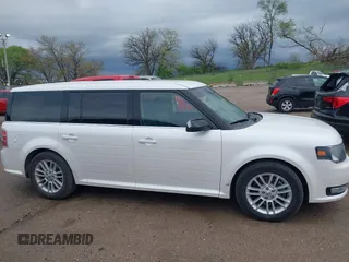 2014 Ford Flex SEL z VIN 2FMGK5C80EBD27605, wystawiony jako IAAI lot #42170336 z przebiegiem 110 339 mil mil oraz . Historia ofert i sprzedaży dostępna na DreamBid. Obrazek 14.