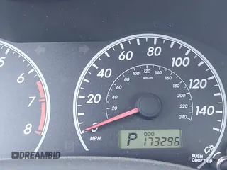 2009 Toyota Corolla with VIN 1NXBU40E69Z034459, listed as a IAAI auction lot 42095649 with 173,296 mi miles. Bid and sale history available at carsss.com. Image 7.