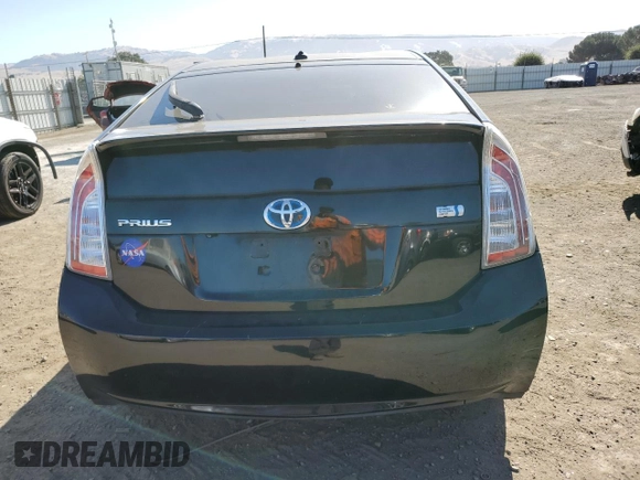 2015 Toyota Prius Four with VIN JTDKN3DU3F1901634, listed as a Copart auction lot 61444925 with 114,611 mi miles and Salvage title. Bid and sale history available at DreamBid. Image 6.