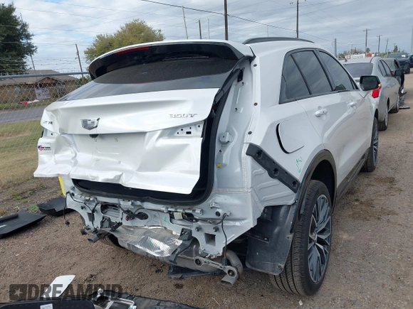 2024 Cadillac XT4 FWD Sport with VIN 1GYFZER48RF180481, listed as a IAAI auction lot 41093587 with 3,982 mi miles and . Bid and sale history available at DreamBid. Image 4.