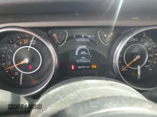 2018 Jeep Wrangler Unlimited Sport S z VIN 1C4HJXDG0JW122629, wystawiony jako Copart lot #56055015 z przebiegiem 130 731 mil mil oraz Czysty tytuł • Clean title. Historia ofert i sprzedaży dostępna na DreamBid. Obrazek 9.