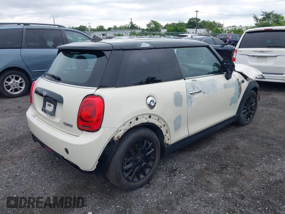 2019 MINI Hardtop Cooper with VIN WMWXP5C58K2H29952, listed as a IAAI auction lot 42745899 with Not provided miles and . Bid and sale history available at DreamBid. Image 4.