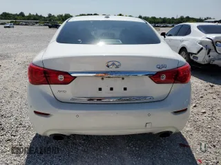 2015 Infiniti Q50 Premium with VIN JN1BV7AR9FM392349, listed as a Copart auction lot 59121255 with 104,199 mi miles and Salvage title. Bid and sale history available at DreamBid. Image 6.