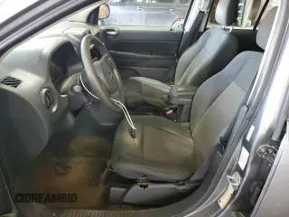 2014 Jeep Compass Sport with VIN 1C4NJDBB6ED592223, listed as a Copart auction lot 63343984 with 124,942 mi miles and Clean Title. Bid and sale history available at carsss.com. Image 7.