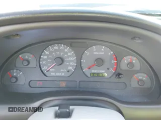 2001 Ford Mustang Standard with VIN 1FAFP40461F264327, listed as a IAAI auction lot 42002990 with 316,107 mi miles. Bid and sale history available at carsss.com. Image 7.