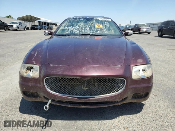 2007 Maserati Quattroporte z VIN ZAMCE39AX70027000, wystawiony jako Copart lot #60355475 z przebiegiem Nie podano mil oraz Czysty tytuł • Clean title. Historia ofert i sprzedaży dostępna na DreamBid. Obrazek 5.