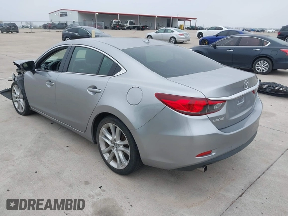 2015 Mazda 6 i Touring with VIN JM1GJ1V56F1209476, listed as a IAAI auction lot 41644215 with 112,255 mi miles. Bid and sale history available at carsss.com. Image 3.