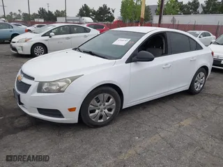 2014 Chevrolet Cruze LS with VIN 1G1PB5SG9E7168906, listed as a IAAI auction lot 42040703 with 217,199 mi miles. Bid and sale history available at carsss.com. Image 2.