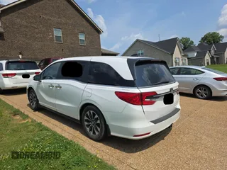 2023 Honda Odyssey EX-L z VIN 5FNRL6H67PB013527, wystawiony jako Copart lot #59705385 z przebiegiem 12 262 mil mil oraz Czysty tytuł • Clean title. Historia ofert i sprzedaży dostępna na DreamBid. Obrazek 3.