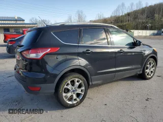 2014 Ford Escape Titanium with VIN 1FMCU9J94EUE57909, listed as a Copart auction lot 51955785 with 154,819 mi miles and Salvage Title. Bid and sale history available at DreamBid. Image 3.