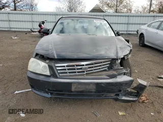 2001 Kia Optima LX z VIN KNAGD126315028712, wystawiony jako Copart lot #85302564 z przebiegiem 81 722 mil mil oraz Nie do naprawy • Non repairable. Historia ofert i sprzedaży dostępna na DreamBid. Obrazek 5.